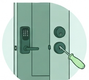 Licensed handyman Montclair repairing front door lock